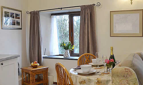 Open plan lounge/diner/kitchen at The Smithy, near Brentor, Devon